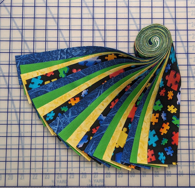 How to Make a Quilt Using a Jelly Roll Material